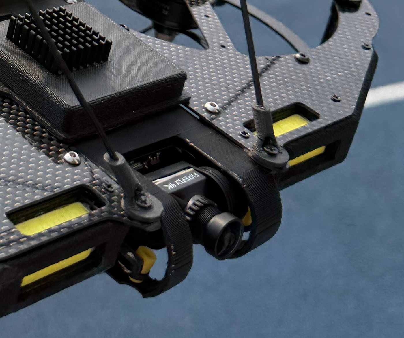 Close-up of the 4K camera and yellow industrial LEDs